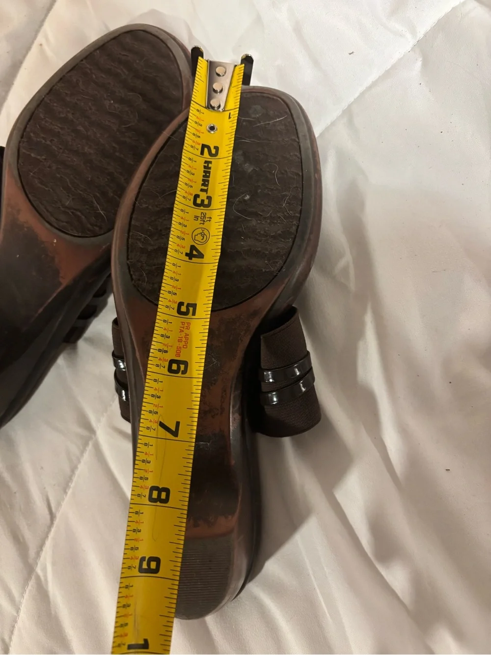 Woman’s size 8 brown sandals with small heel